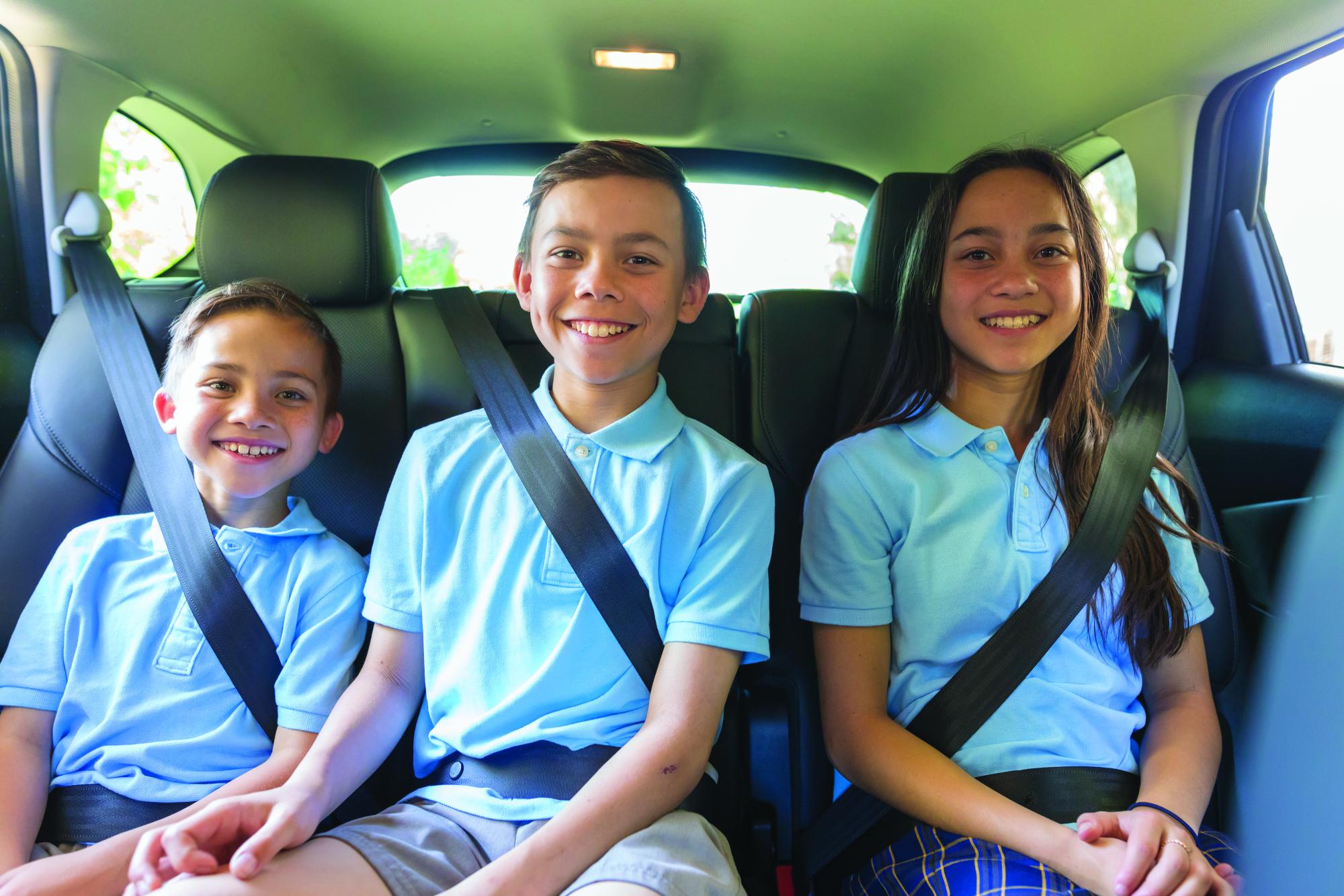 Children in back seat of car